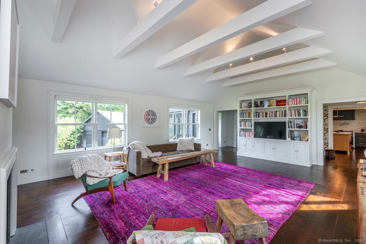 30 Knibloe Hill Road Sharon, CT 06069 - Photo 8 of 32 a bedroom with a bed and wooden floor