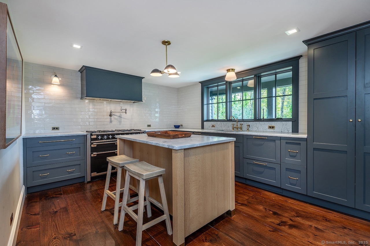 30 Knibloe Hill Road Sharon, CT 06069 - Photo 10 of 32 a kitchen with a sink and cabinets
