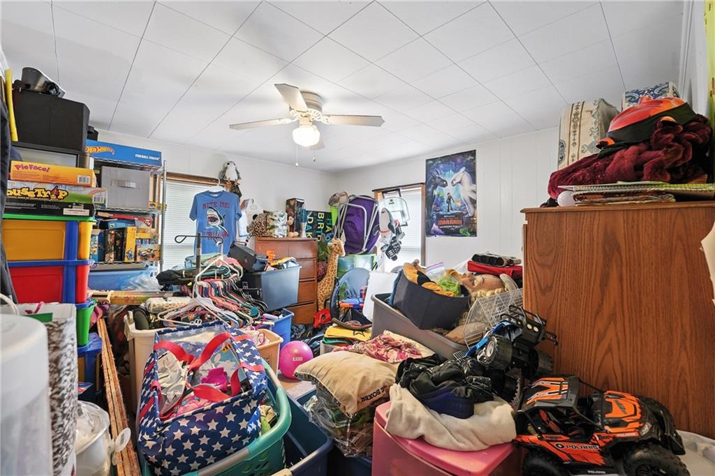 1401 Chestnut Street Franklin, PA 16323 - Photo 17 of 19 a bedroom with furniture and a gym equipment