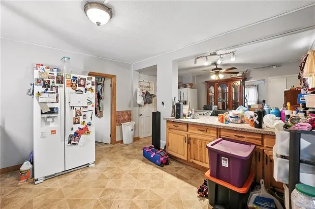 a view of a kitchen and dining room