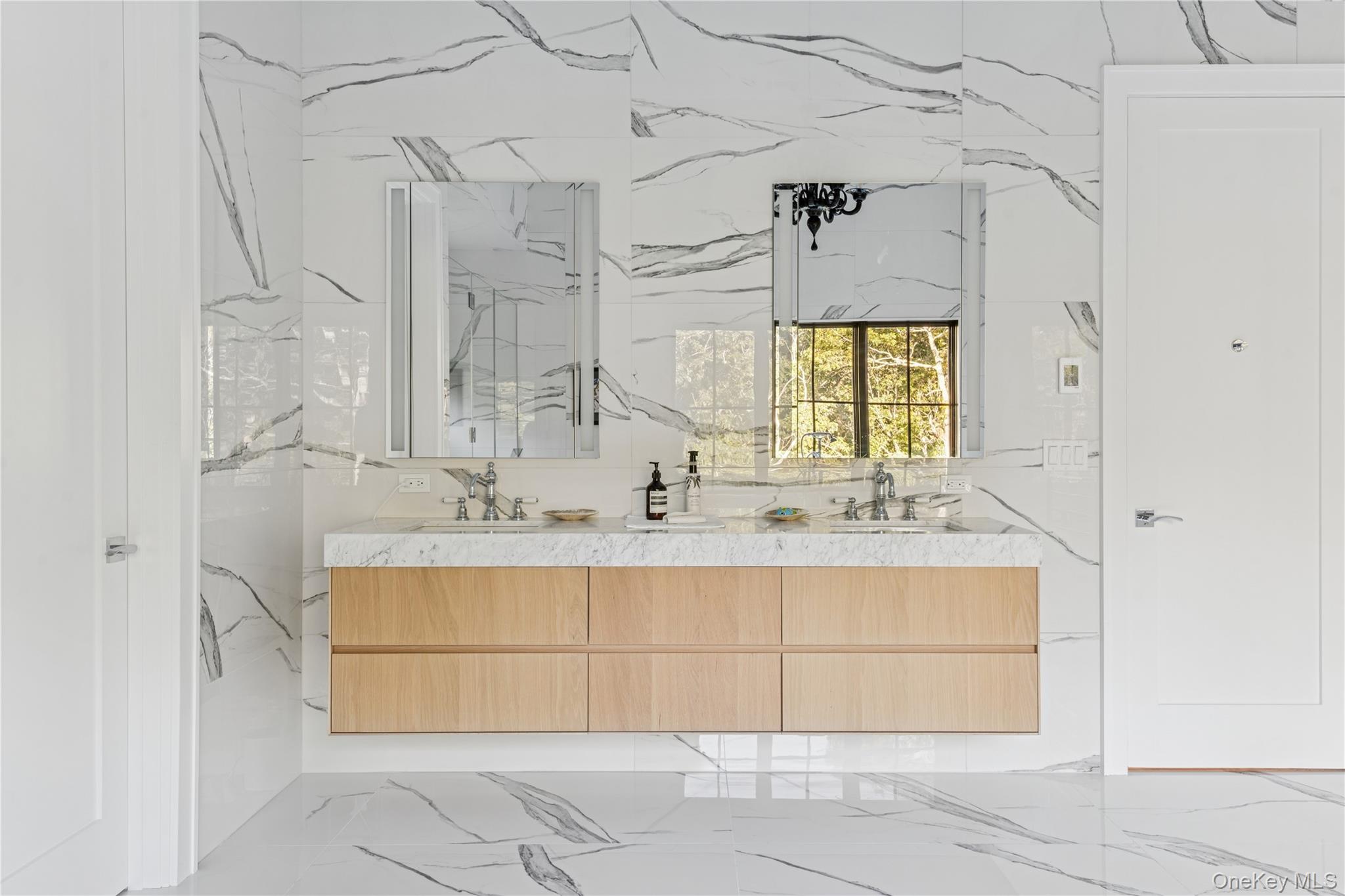 780 Sagg Road Sagaponack, NY 11962 - Photo 28 of 47 Bathroom featuring light marble finish flooring and double vanity