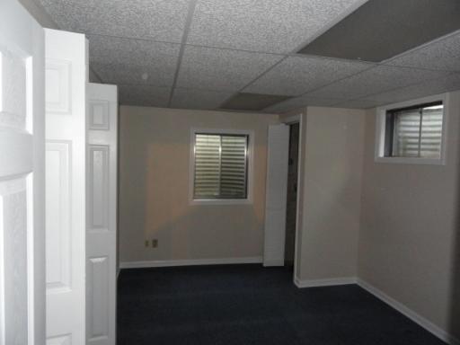 216 Homewood Drive Bolingbrook, IL 60440 - Photo 13 of 16 a view of a room that has a window in it