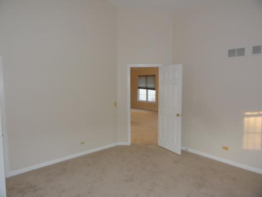 216 Homewood Drive Bolingbrook, IL 60440 - Photo 4 of 16 a view of an empty room and closet area