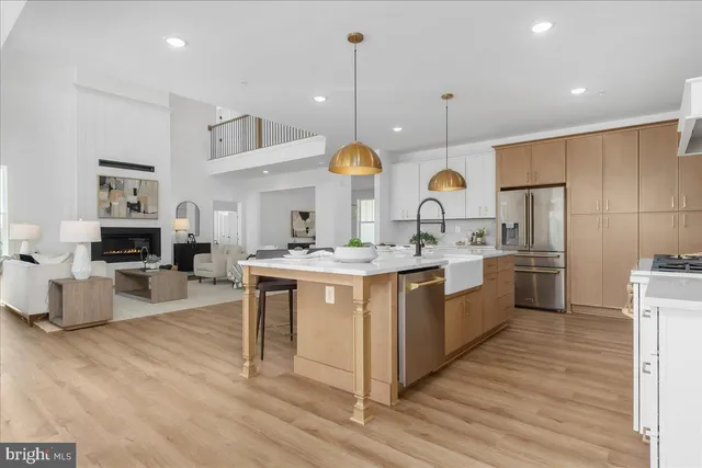 a kitchen with sink cabinets and window