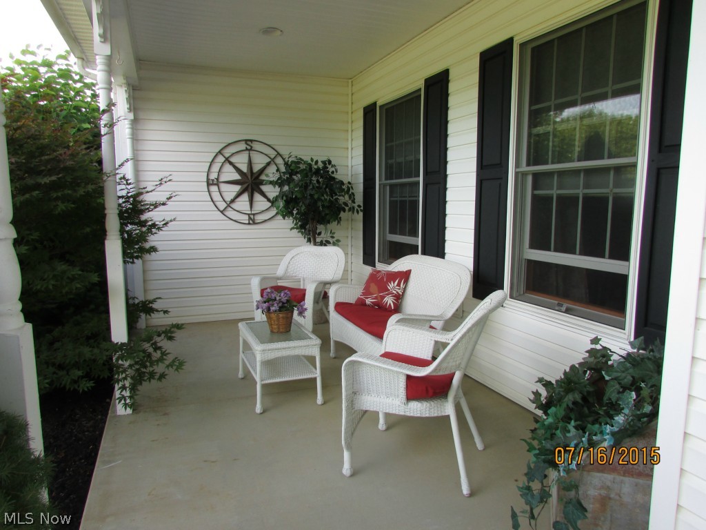 4645 Rock Spring Road Ravenna, OH 44266 - Photo 9 of 25 The front porch is charming. Enter into the foyer and see the rest of the house!