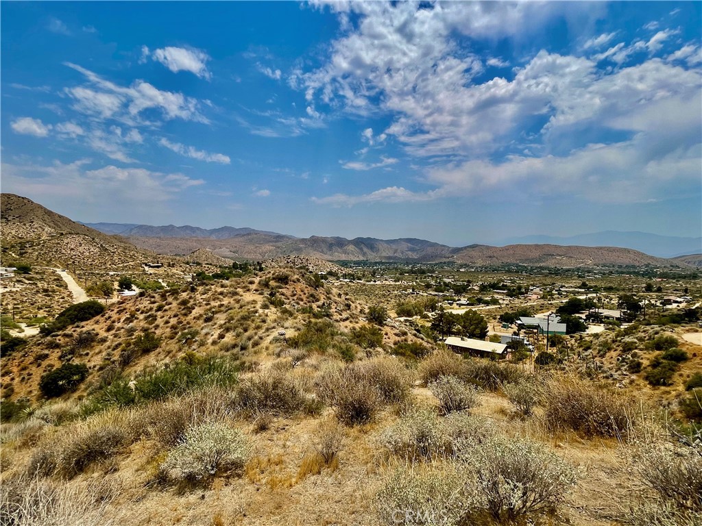 0 Pinon Avenue Morongo Valley, CA 92256 - Photo 14 of 24 a view of city and mountain