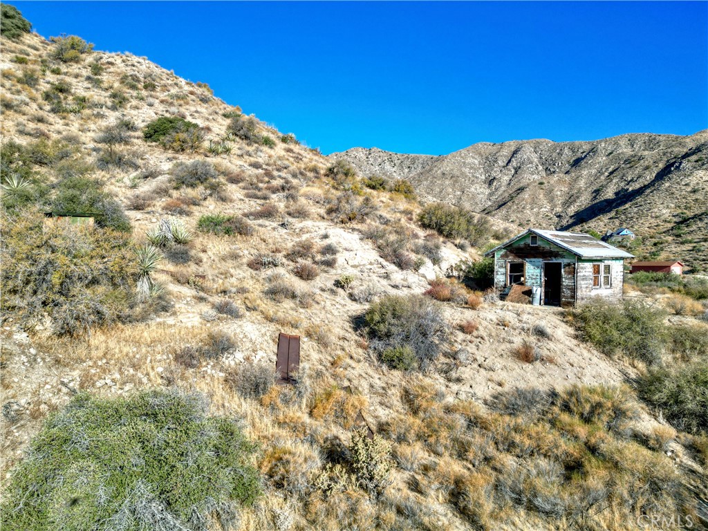 0 Pinon Avenue Morongo Valley, CA 92256 - Photo 5 of 24 a view of a large mountain with a mountain in the background