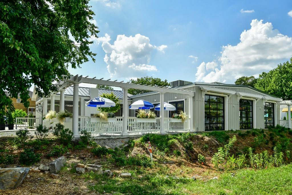 210 Sampson Street Northeast, Unit 5 Atlanta, GA 30312 - Photo 28 of 33 a view of a house with a big yard and potted plants