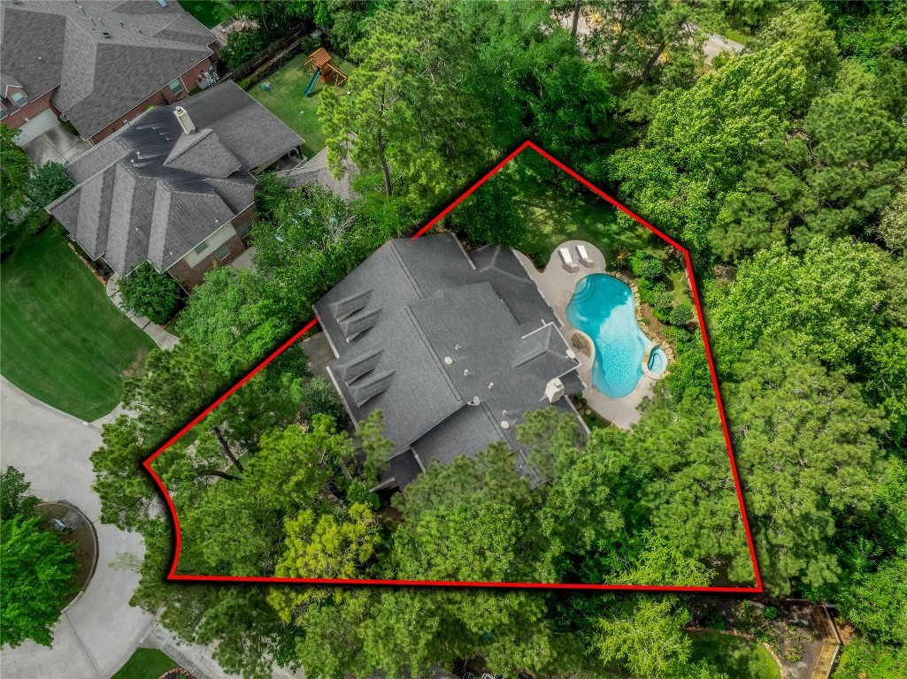 19 Millwright Place The Woodlands, TX 77382 - Photo 2 of 45 Set on a rare 1/3 acre cul-de-sac lot with no rear neighbors and plenty of trees, this is a gem you don't want to miss!