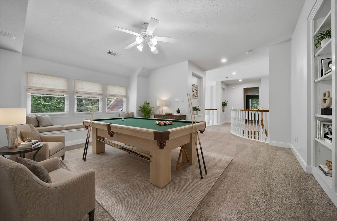19 Millwright Place The Woodlands, TX 77382 - Photo 21 of 45 Upstairs the kiddos will love having their own space to play in the gameroom. Built-ins provide nice storage for games, books, toys, or media equipment.