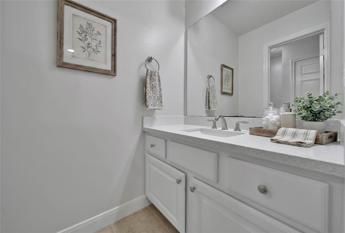 19 Millwright Place The Woodlands, TX 77382 - Photo 28 of 45 Each side offers an oversized vanity with great storage for a space that's easy to use and love.