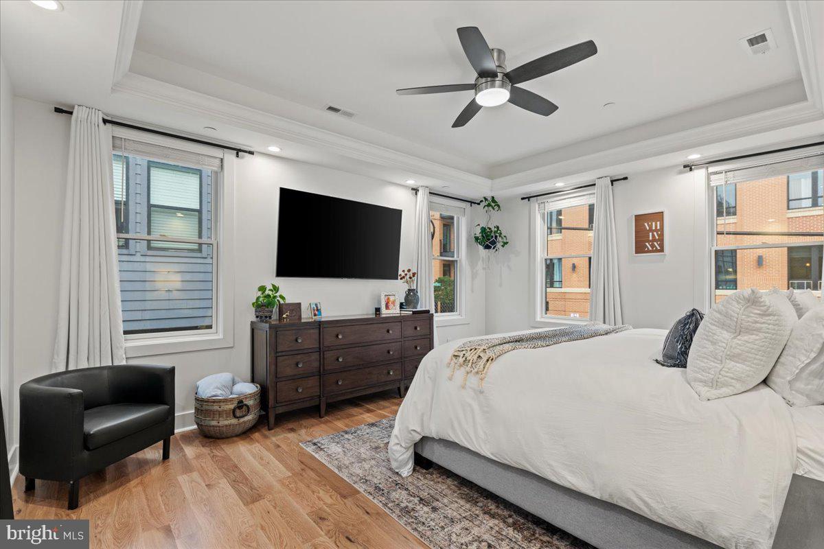 3424 Toone Street Baltimore, MD 21224 - Photo 12 of 87 a bedroom with a bed and a flat screen tv