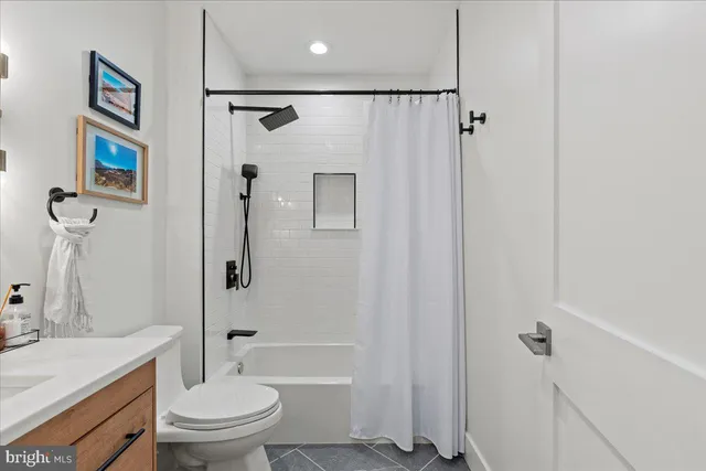 a bedroom with a bed and furniture