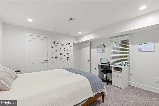 a view of a livingroom with furniture and windows