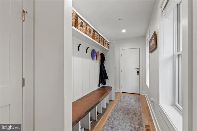a view of storage and utility room with washer and dryer