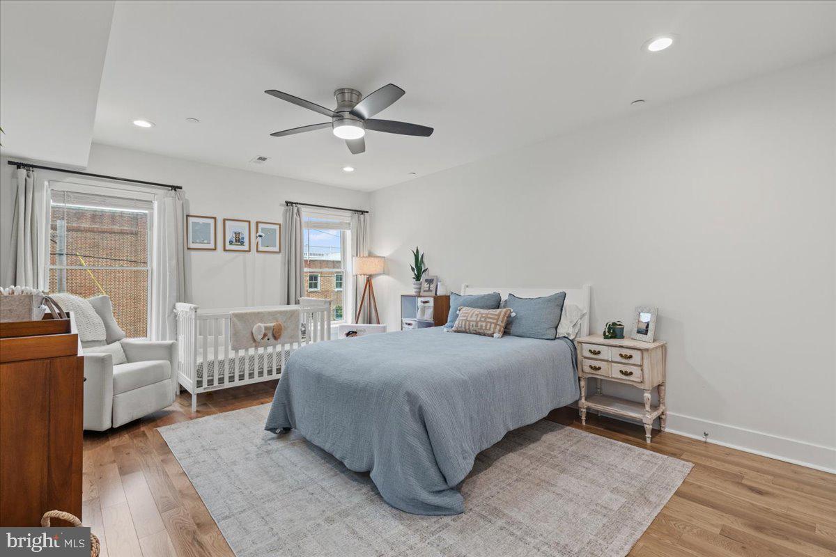 3424 Toone Street Baltimore, MD 21224 - Photo 30 of 87 a bedroom with a bed and a couch