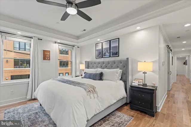 a view of a kitchen counter space with wooden floor and floors