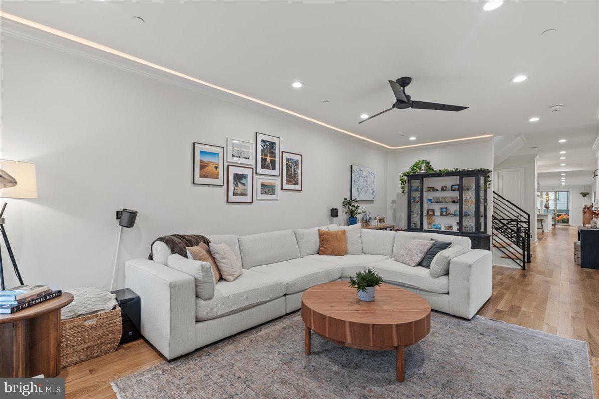 3424 Toone Street Baltimore, MD 21224 - Photo 55 of 87 a living room with furniture and a wooden floor