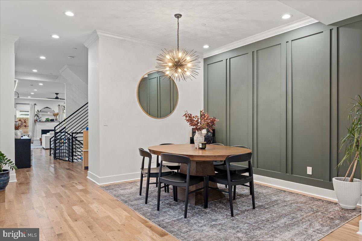 3424 Toone Street Baltimore, MD 21224 - Photo 57 of 87 a view of a dining room with furniture and wooden floor