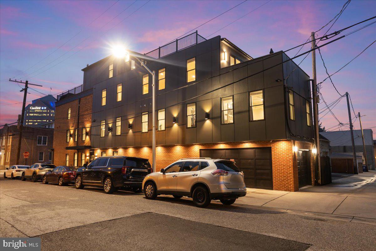 3424 Toone Street Baltimore, MD 21224 - Photo 76 of 87 Side View - Night + Dedicated On Street Parking