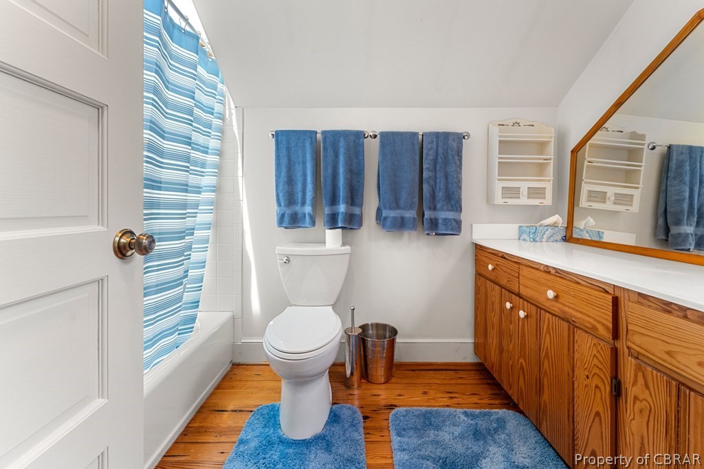 1 Cabin Road Lottsburg, VA 22511 - Photo 45 of 50 Full bathroom featuring vanity, shower / tub combo, toilet, and hardwood / wood-style floors