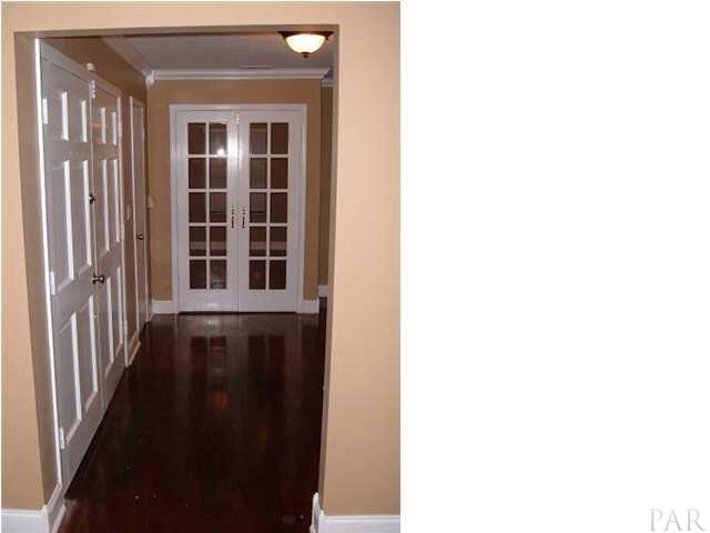 10209 Gallows Road Cantonment, FL 32533 - Photo 12 of 22 Foyer with Office doors and front doors.