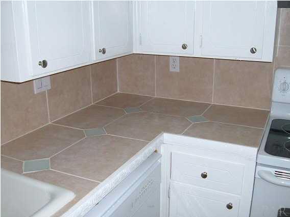 10209 Gallows Road Cantonment, FL 32533 - Photo 6 of 22 New counter tops with custom tile design.
