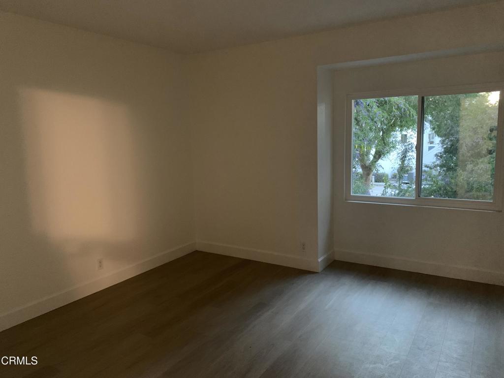 639 Springbrook North, Unit 48 Irvine, CA 92614 - Photo 8 of 12 an empty room with a window