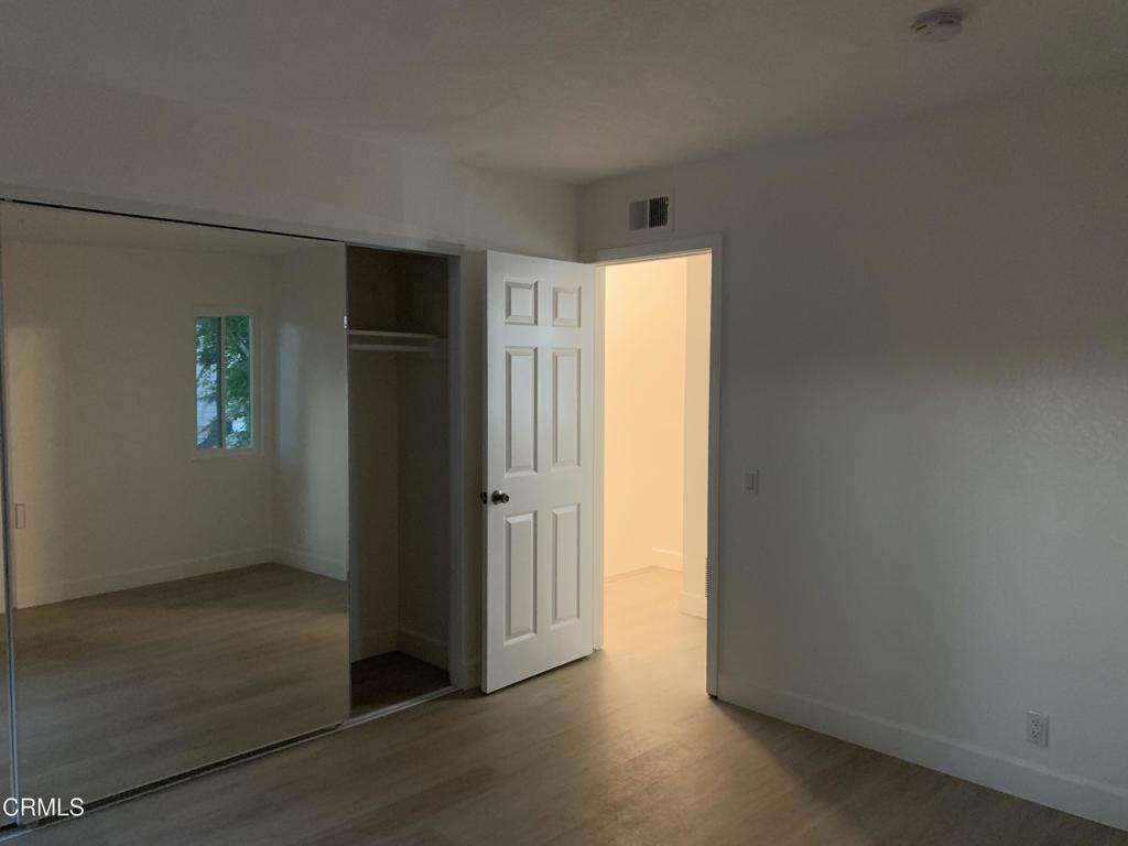 639 Springbrook North, Unit 48 Irvine, CA 92614 - Photo 9 of 12 an empty room with windows