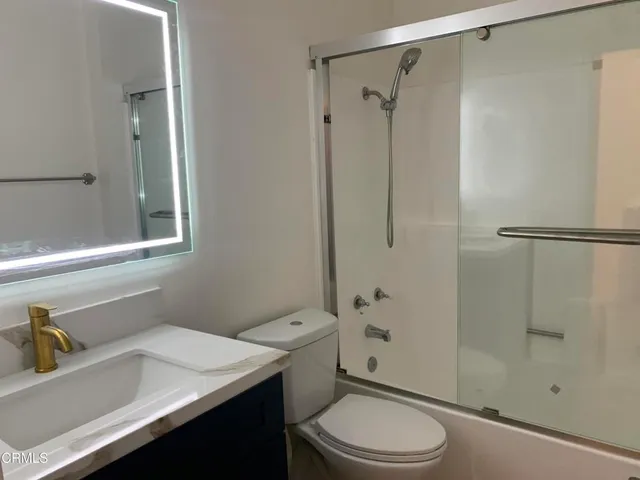 an empty room with a wooden floor