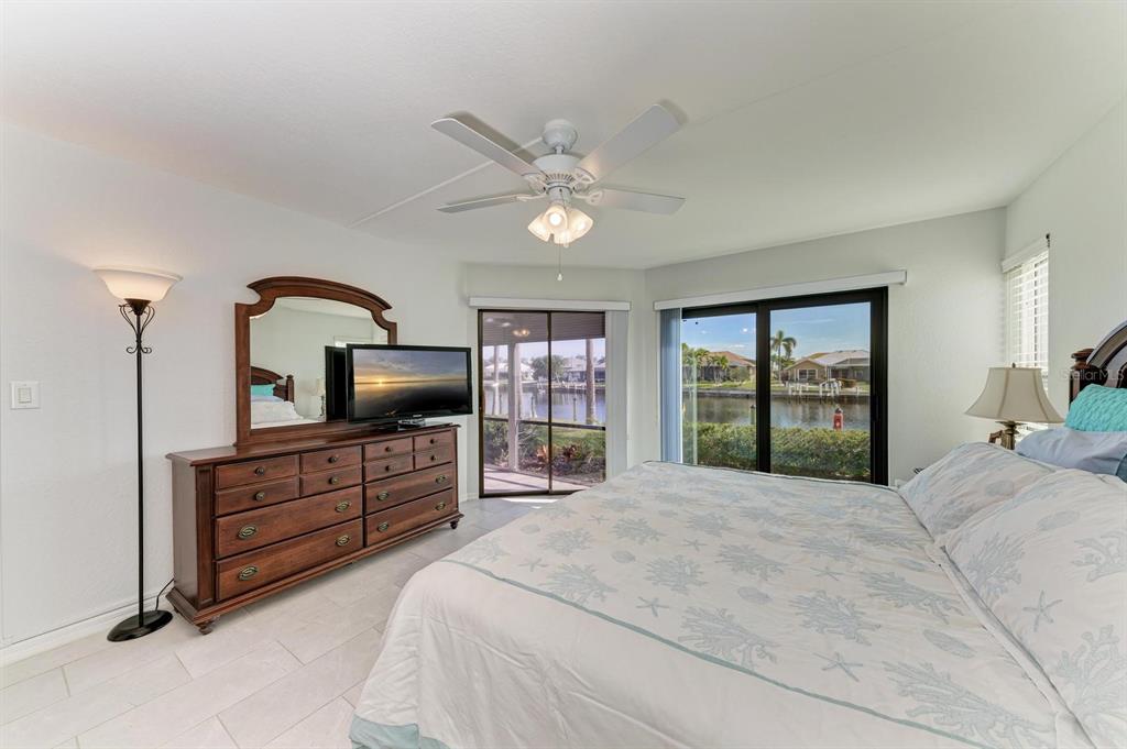 601 Shreve Street, Unit 46A Punta Gorda, FL 33950 - Photo 11 of 23 a large bedroom with bed and a large window