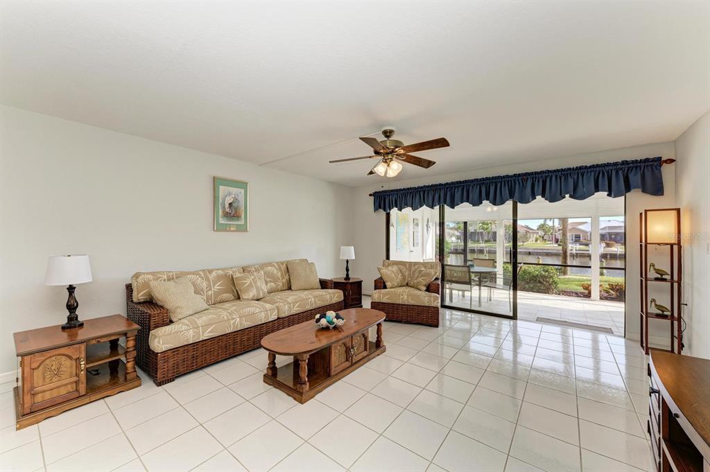 601 Shreve Street, Unit 46A Punta Gorda, FL 33950 - Photo 8 of 23 a living room with furniture and a large window