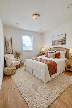 a bedroom with bed and a couch