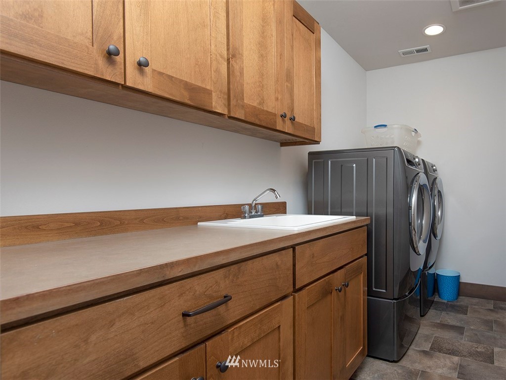 21020 30th Drive Southeast Bothell, WA 98021 - Photo 22 of 37 a utility room with dryer and washer