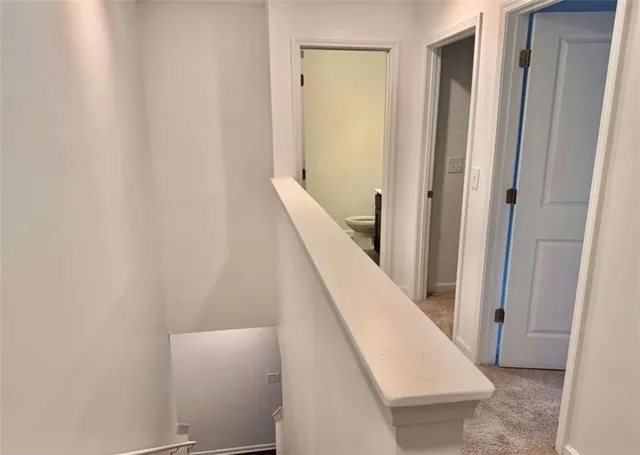 a view of hallway with stairs