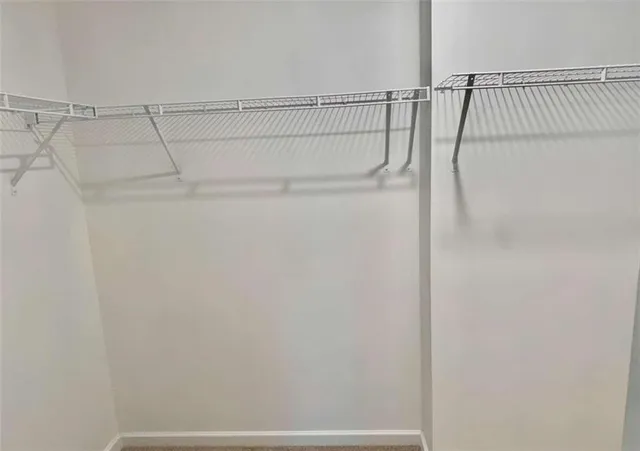 a view of small space with racks on the wall