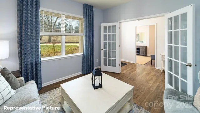 a view of livingroom with furniture and wooden floor