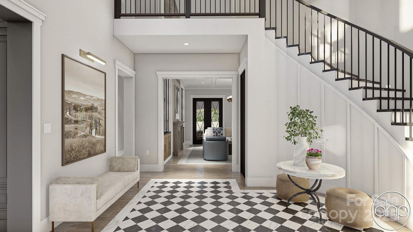 1025 Maxwell Court, Unit 7 Marvin, NC 28173 - Photo 4 of 11 a living room with furniture and a rug