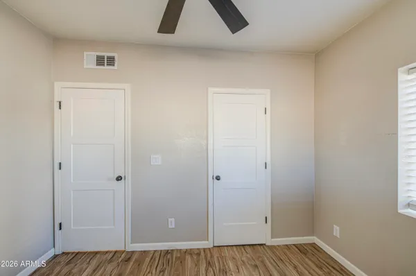 an empty room with closet