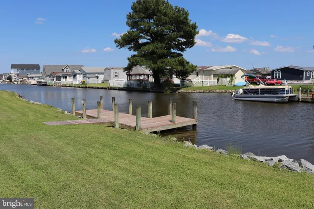 a swimming pool view with a lake view