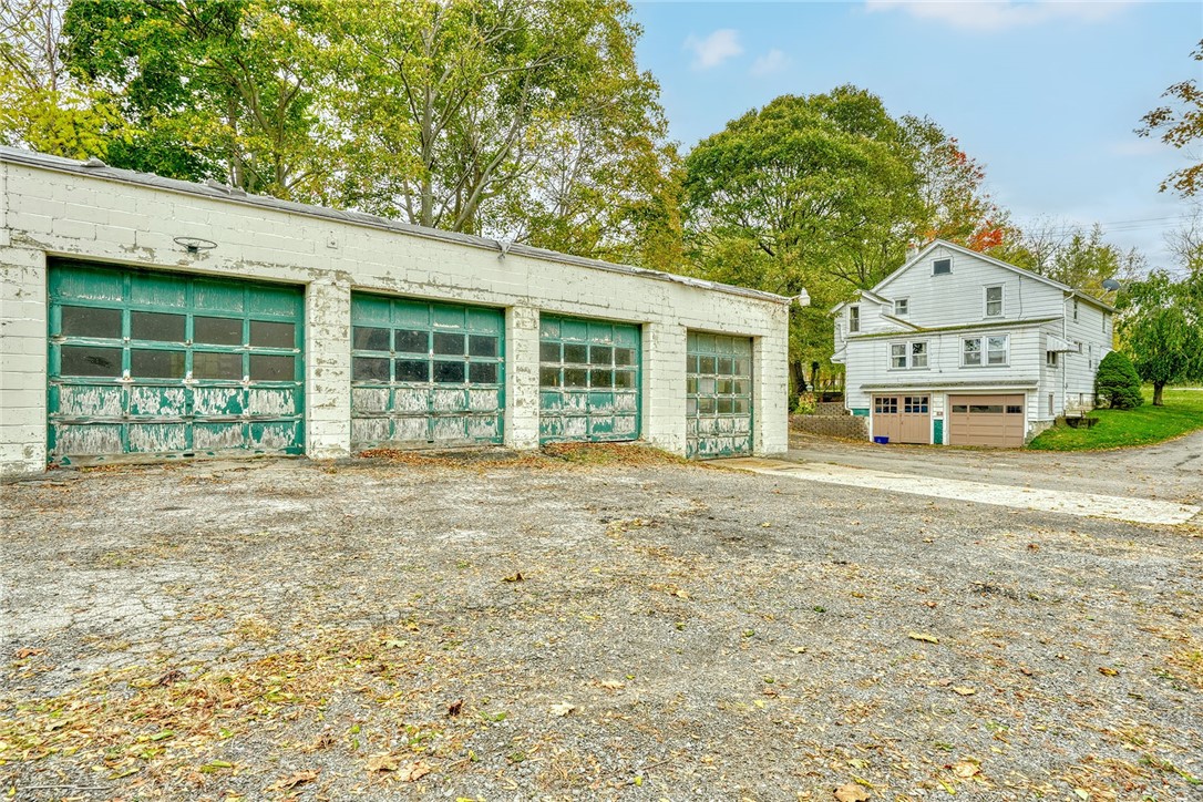 904 Lake Road, Unit 900902 Webster, NY 14580 - Photo 47 of 50 5-BAY GARAGE & 900 DRIVE-IN BASEMENT GARAGE