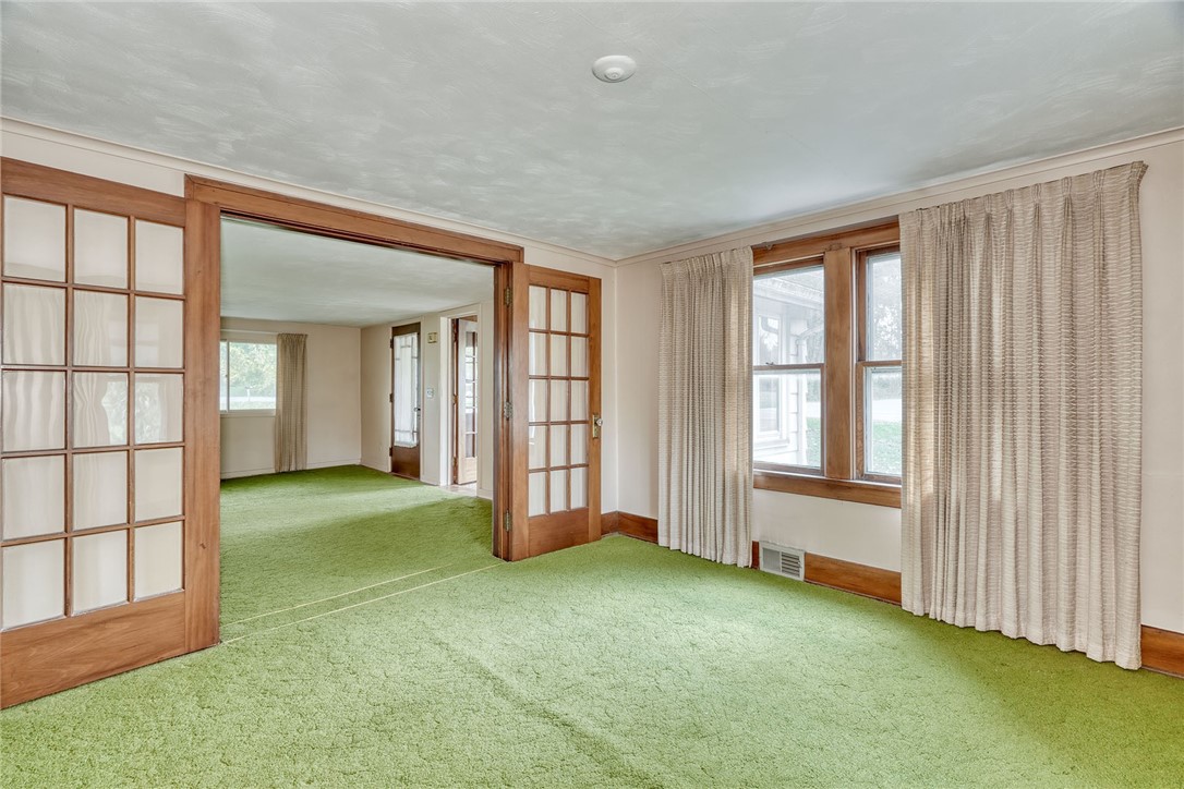 904 Lake Road, Unit 900902 Webster, NY 14580 - Photo 6 of 50 #900-PARLOR/FAMILY ROOM**Hardwoods under carpeting