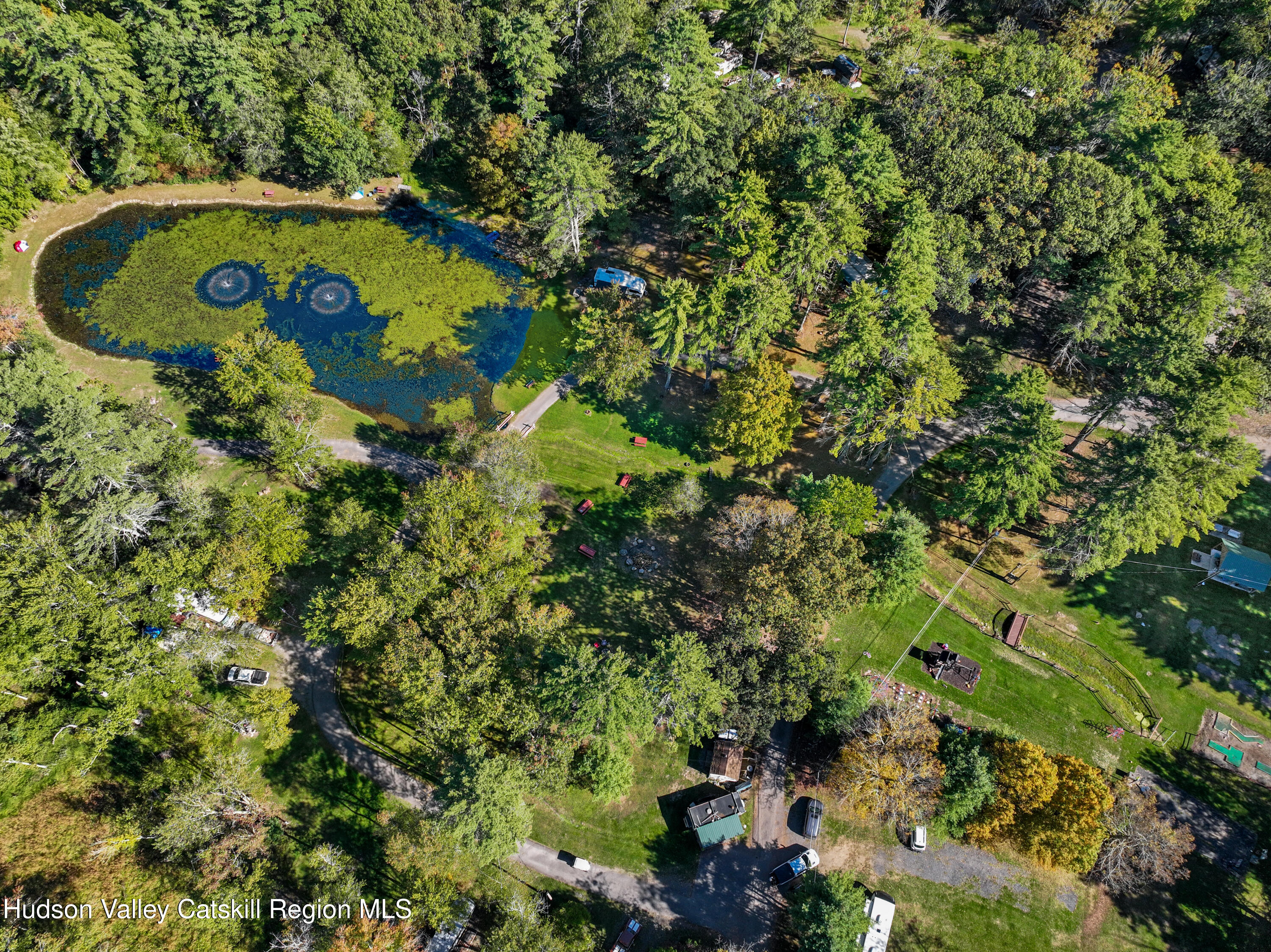 425 Woodland Road Accord, NY 12404 - Photo 12 of 28 an aerial view of a residential houses with yard and outdoor seating