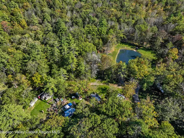 a view of backyard with green space