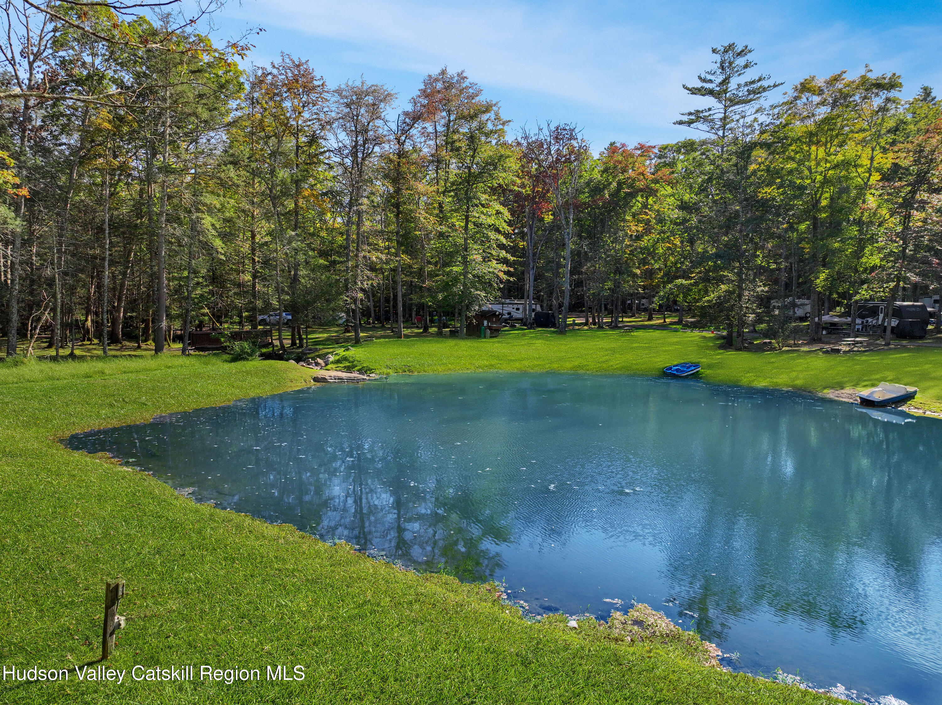 425 Woodland Road Accord, NY 12404 - Photo 20 of 28 a view of a golf course with a lake
