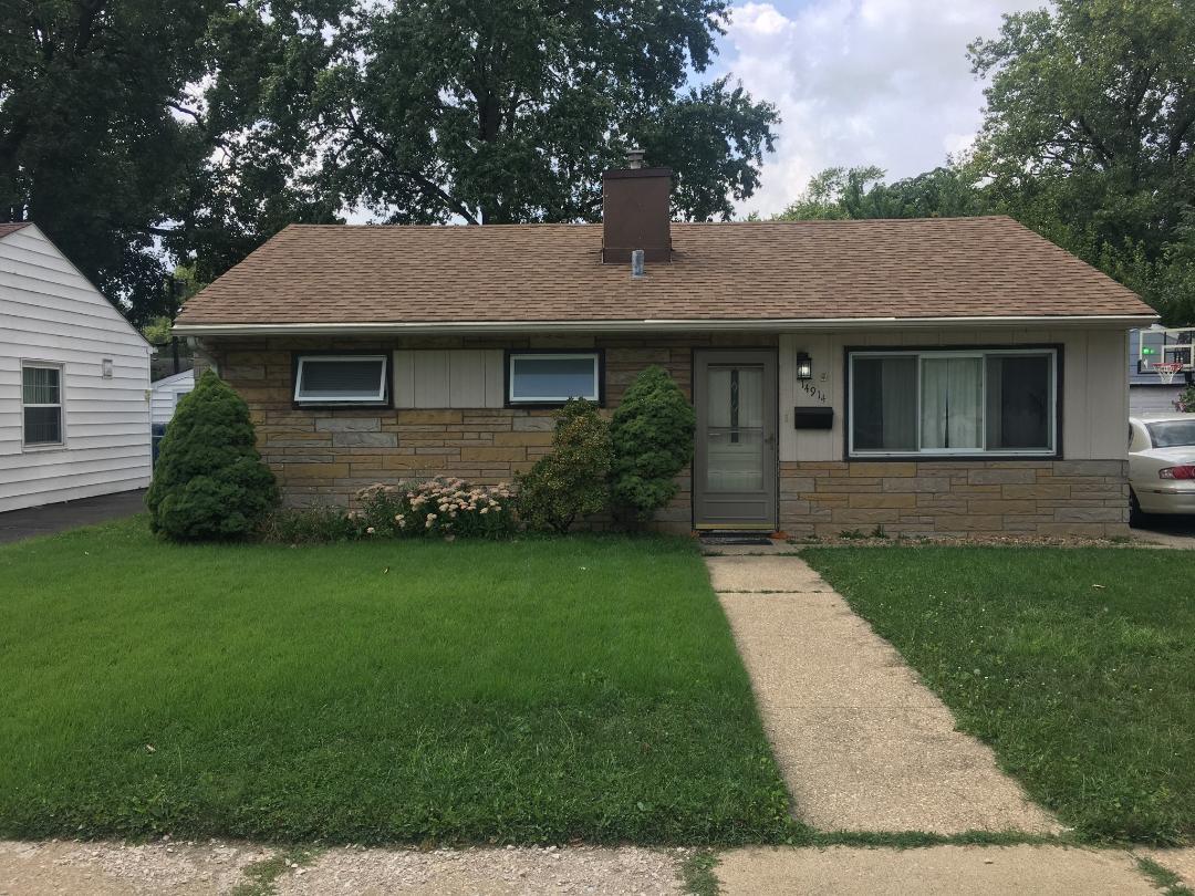 14914 Kedvale Avenue Midlothian, IL 60445 - Photo 1 of 12 a front view of a house with a garden