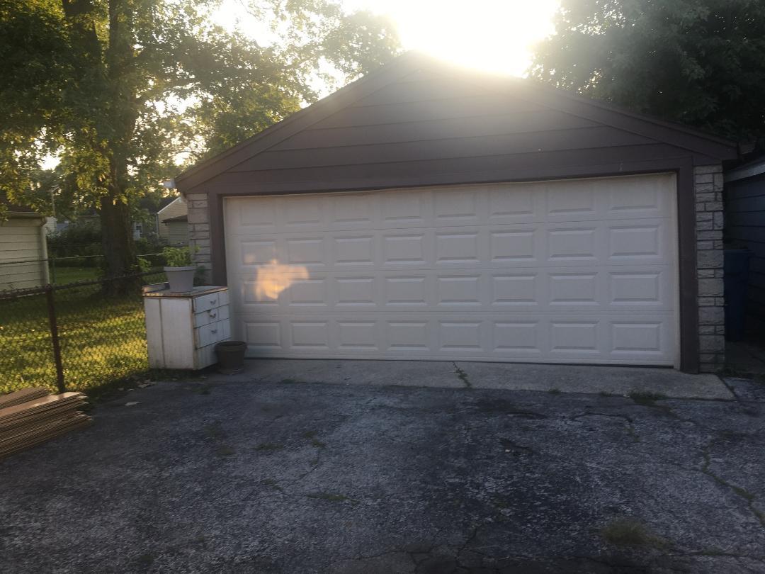 14914 Kedvale Avenue Midlothian, IL 60445 - Photo 11 of 12 a view of backyard with plants and large tree