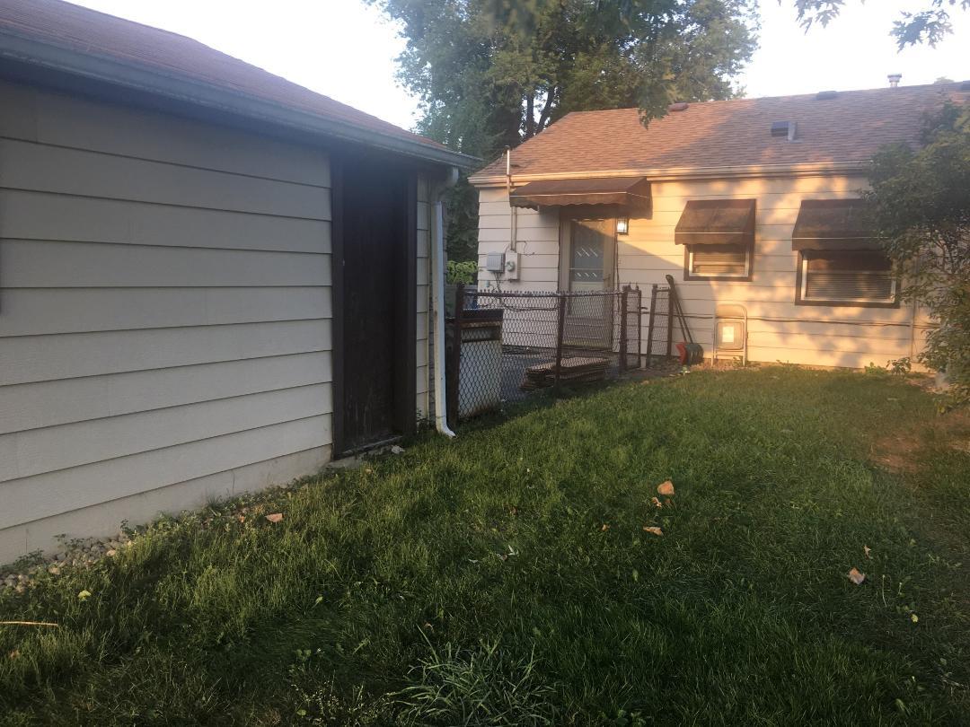14914 Kedvale Avenue Midlothian, IL 60445 - Photo 12 of 12 a front view of a house with a yard