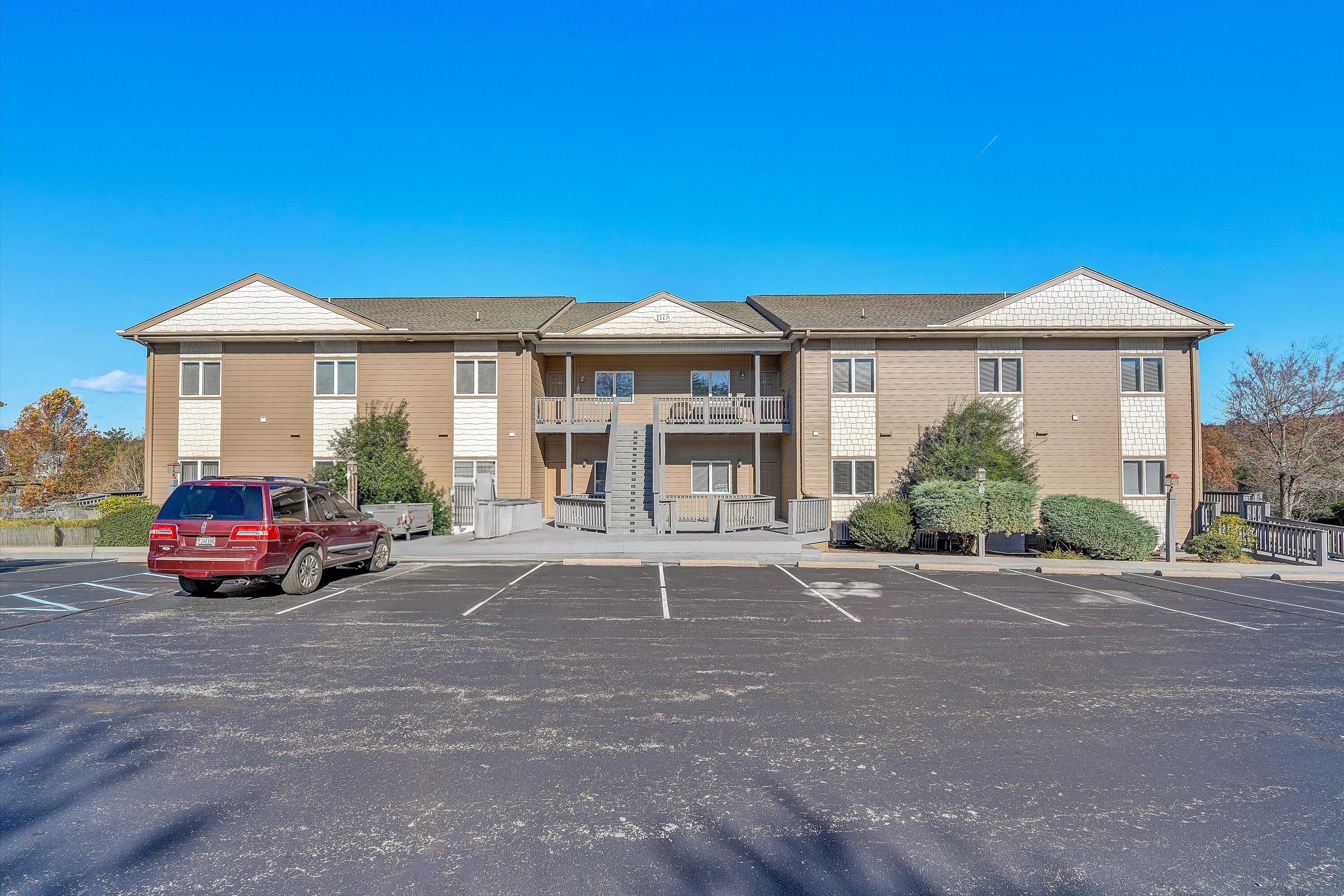 a view of house with a outdoor space and porch