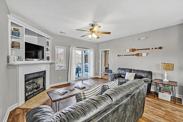 a bedroom with a bed and a fireplace